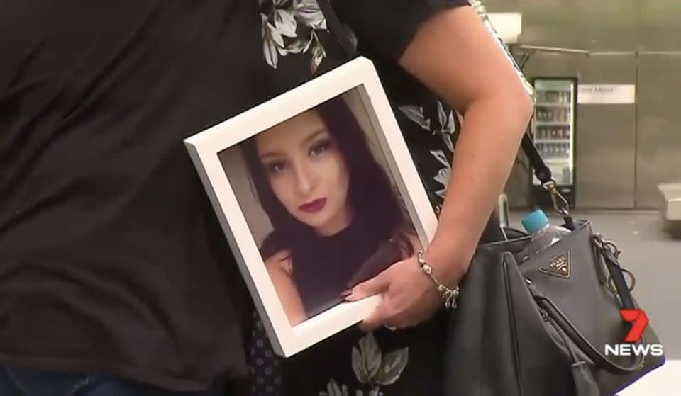 Natasha's mother clutches a photo of her outside court. Source: 7 News