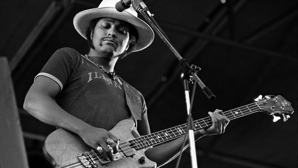 Tiran Porter of Doobie Brothers performing on stage, Knebworth, United Kingdom, 1974.