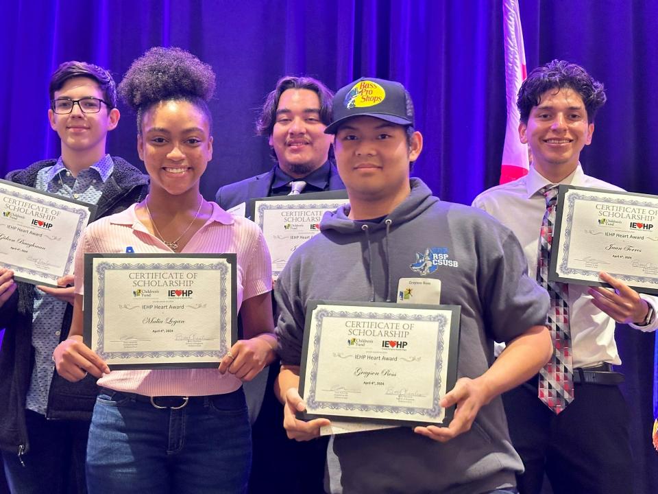 Five of six IEHP Heart Award recipients during the San Bernardino County Children's Network's annual Shine a Light on Child Abuse Breakfast on April 4 in Ontario. Pictured from left to right: Gideon Baughman of Hesperia, Malia Logan of Rancho Cucamonga, Joey Zamora of San Bernardino, Grayson Ross of Rancho Cucamonga and Juan Torres of Taylor Mill, Kentucky. Kathleen Castellanos of San Bernardino was not included in the photo.