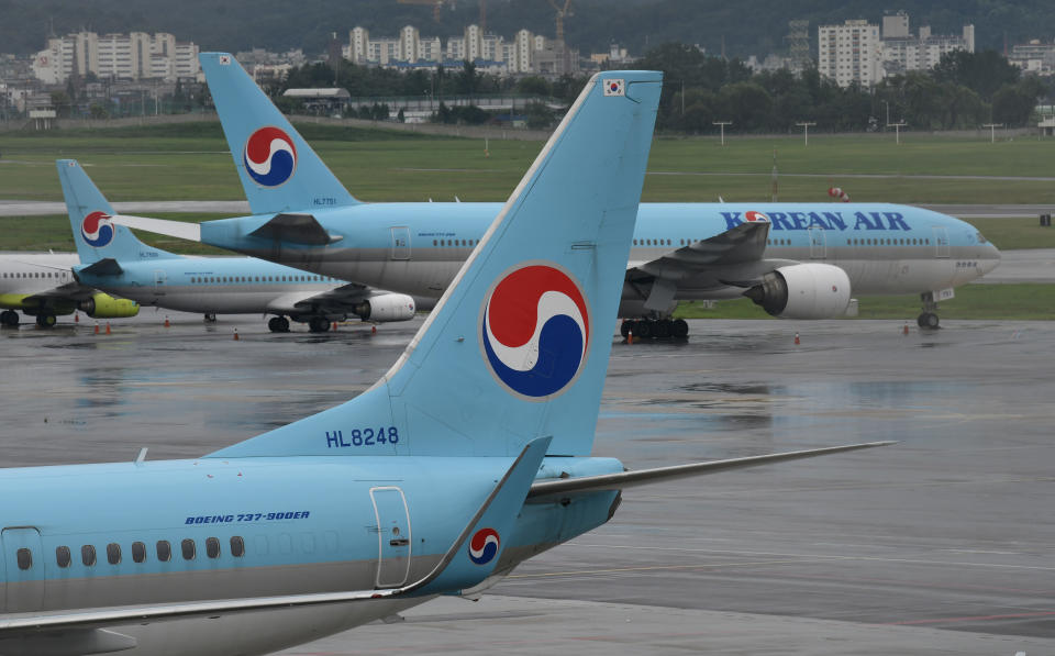 Korean Air planes are parked on the tarmac ahead of the arrival of Typhoon Maysak at Gimpo domestic airport in Seoul on September 2, 2020. - Flights were grounded in South Korea and storm warnings issued on both sides of the Korean peninsula as a typhoon forecast to be one of the most powerful in years made its approach on September 2. (Photo by Jung Yeon-je / AFP) (Photo by JUNG YEON-JE/AFP via Getty Images)