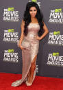 Celebrities in metallic fashion: Snooki showed off her slim physique in this thigh-high split dress.<br><br>[Rex]