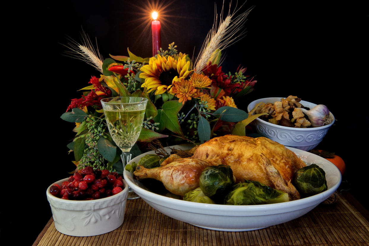 Flowers add fabulous, festive flair to the holiday table. (Photo: Getty)