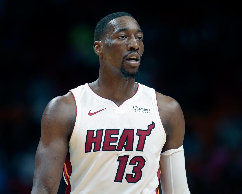 Miami Heat center Bam Adebayo (13) looks on during the first half of an NBA basketball game, Thursday, March 28, 2019, in Miami. The Heat defeated the Mavericks 105-99. (AP Photo/Joel Auerbach)