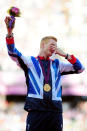 LONDON, ENGLAND - AUGUST 05: Gold medalist Greg Rutherford of Great Britain pose on the podium for Men's Long Jump on Day 9 of the London 2012 Olympic Games at the Olympic Stadium on August 5, 2012 in London, England. (Photo by Mike Hewitt/Getty Images)