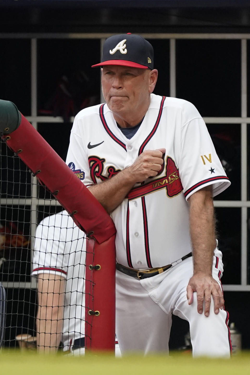 Atlanta Braves manager Brian Snitker watches from the dugout during the team's baseball game against the Oakland Athletics on Wednesday, June 8, 2022, in Atlanta. (AP Photo/John Bazemore)