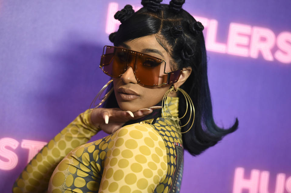 FILE - Cardi B arrives at a photo call for "Hustlers" on Aug. 25, 2019, in Beverly Hills, Calif . The rapper turns 29 on Oct. 11. New York City Mayor Eric Adams announced Wednesday that Cardi B had offered to the financial relief for victims of the Bronx fire. The Grammy-winning artist grew up in the Bronx. (Photo by Jordan Strauss/Invision/AP, File)