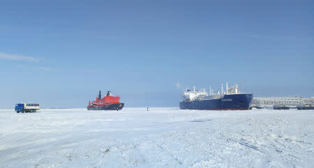 FILE PHOTO: The Christophe de Margerie (R), an ice-class tanker fitted out to transport liquefied natural gas, is docked in Arctic port of Sabetta, Yamalo-Nenets district, Russia March 30, 2017. REUTERS/Olesya Astakhova/File Photo