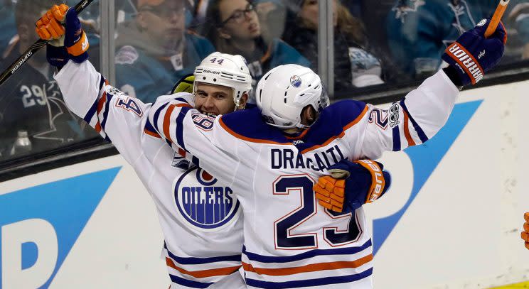 Edmonton Oilers’ Zack Kassian, left, celebrates his goal wit teammate Leon Draisaitl (29) during the third period in Game 3 against the San Jose Sharks. (Marcio Jose Sanchez/AP)
