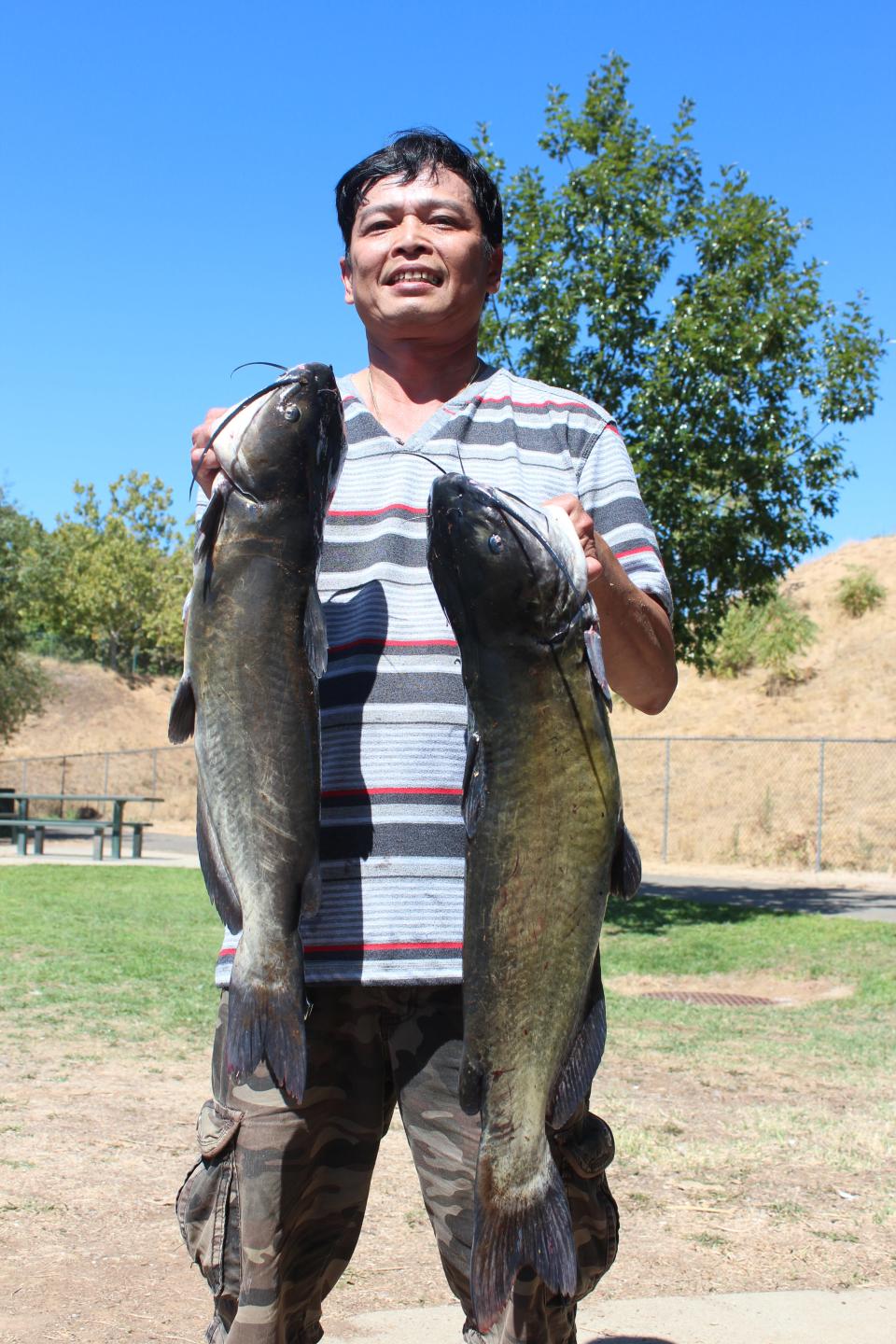 Liem Nguyen of Sacramento landed two channel cats weighing 8 and 9 pounds while using squid at Granite Regional Park in Sacramento on Sept. 3.