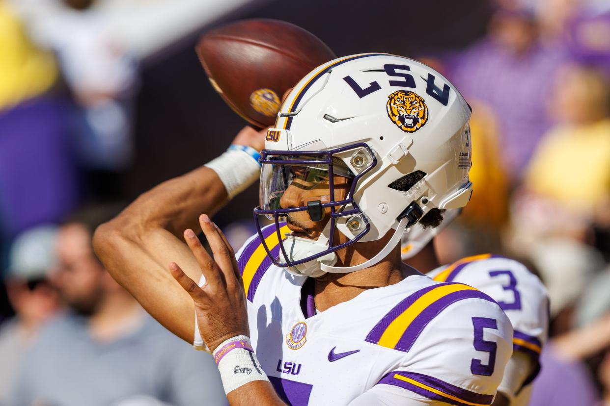 LSU Tigers quarterback Jayden Daniels (5) during warmups before the game against the Texas A&M Aggies at Tiger Stadium. Mandatory Credit: Stephen Lew-USA TODAY Sports