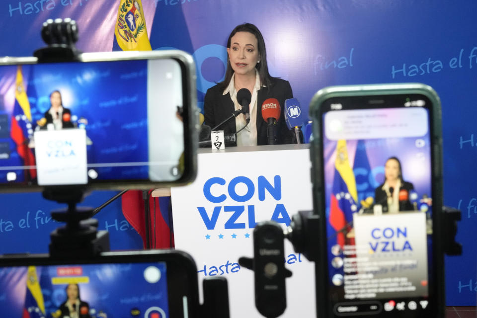 FILE - Opposition presidential hopeful Maria Corina Machado gives a press conference at her campaign headquarters in Caracas, Venezuela, Dec. 15, 2023. Machado has been sidelined from running in the upcoming presidential election by the Nicolas Maduro government. (AP Photo/Matias Delacroix, File)