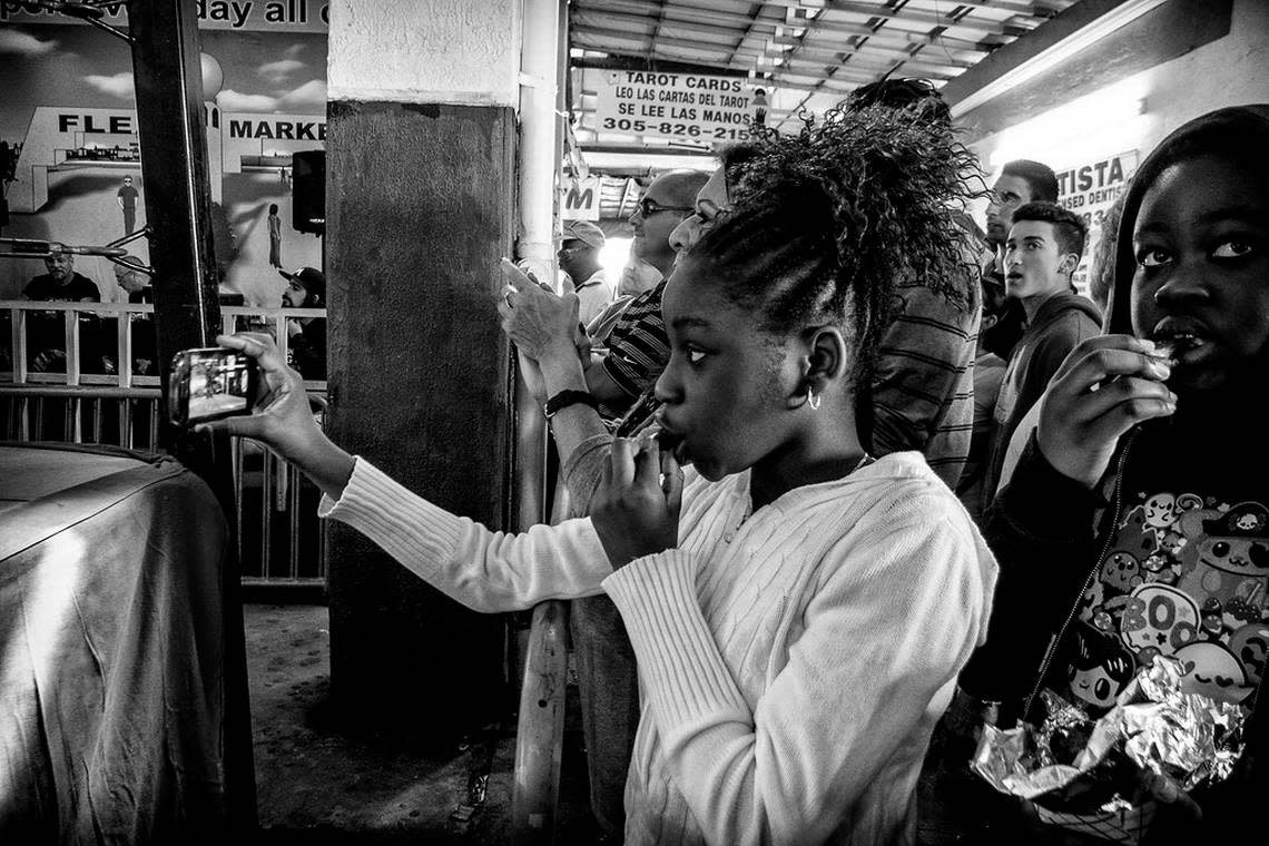 Spectators watch a Coastal Championship Wrestling event at the Opa-locka Flea Market in December 2015. The flea market is closing on Sept. 30, 2022.