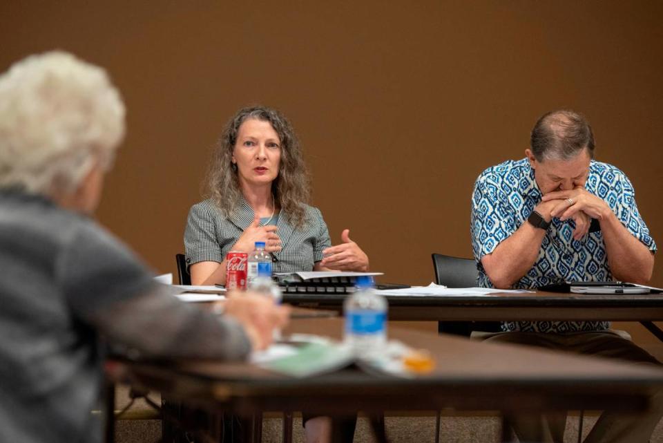 Harrison County Library Director Sarah Crisler-Ruskey, center, speaks during a Harrison County library system board meeting at West Biloxi Library in Biloxi on Monday, July 25, 2022.