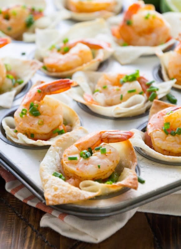 <p>Julie's Eats& Treats</p><p>Crunchy wonton shells stuffed with pico de gallo, guacamole and seasoned shrimp. It’s a light appetizer that won't leave you feeling guilty! </p><p><strong>Get the recipe: <a href="https://www.julieseatsandtreats.com/light-tex-mex-shrimp-bites-recipe/" rel="nofollow noopener" target="_blank" data-ylk="slk:Light Tex Mex Shrimp Wonton Cups;elm:context_link;itc:0;sec:content-canvas" class="link ">Light Tex Mex Shrimp Wonton Cups</a></strong></p>