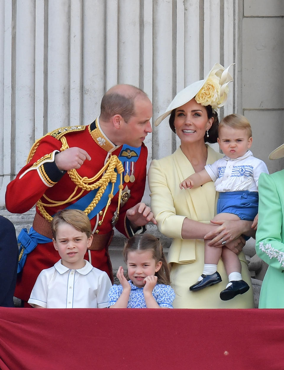 (L-R) Britain's Prince William, Duke of Cambridge, Prince George, Princess Charlotte and Britain's Catherine, Duchess of Cambridge holding Prince Louis stand with other members of the Royal Family on the balcony of Buckingham Palace to watch a fly-past of aircraft by the Royal Air Force, in London on June 8, 2019. - The ceremony of Trooping the Colour is believed to have first been performed during the reign of King Charles II. Since 1748, the Trooping of the Colour has marked the official birthday of the British Sovereign. Over 1400 parading soldiers, almost 300 horses and 400 musicians take part in the event. (Photo by Daniel LEAL-OLIVAS / AFP)        (Photo credit should read DANIEL LEAL-OLIVAS/AFP via Getty Images)