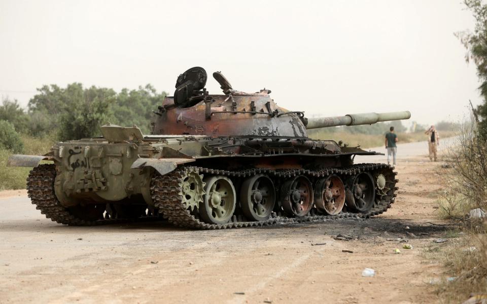 A wrecked tank, reportedly belonging to the LNA, in the Al Hira area, south western Tripoli - REUTERS