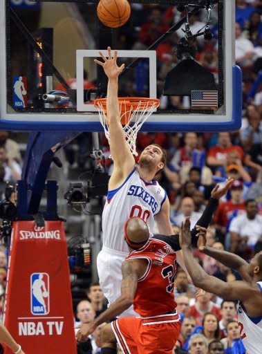 Spencer Hawes of the Philadelphia 76ers jumps to block a shot by Chicago Bulls' Richard Hamilton during game three of the Eastern Conference first-round NBA playoff series on May 4. The 76ers rallied to beat the Bulls 79-74 and gain a 2-1 lead