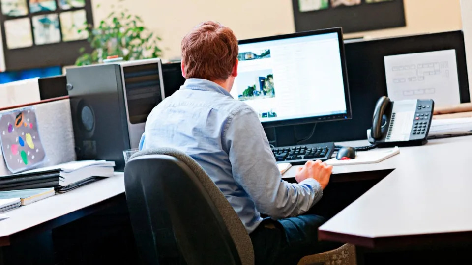 PHOTO: In this undated stock photo, a man is seen working at his desk. (STOCK PHOTO/Getty Images)