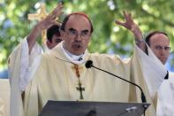 Roman Catholic Cardinal Philippe Barbarin holds Assumption celebrations in the French southwestern city of Lourdes, on August 15, 2016