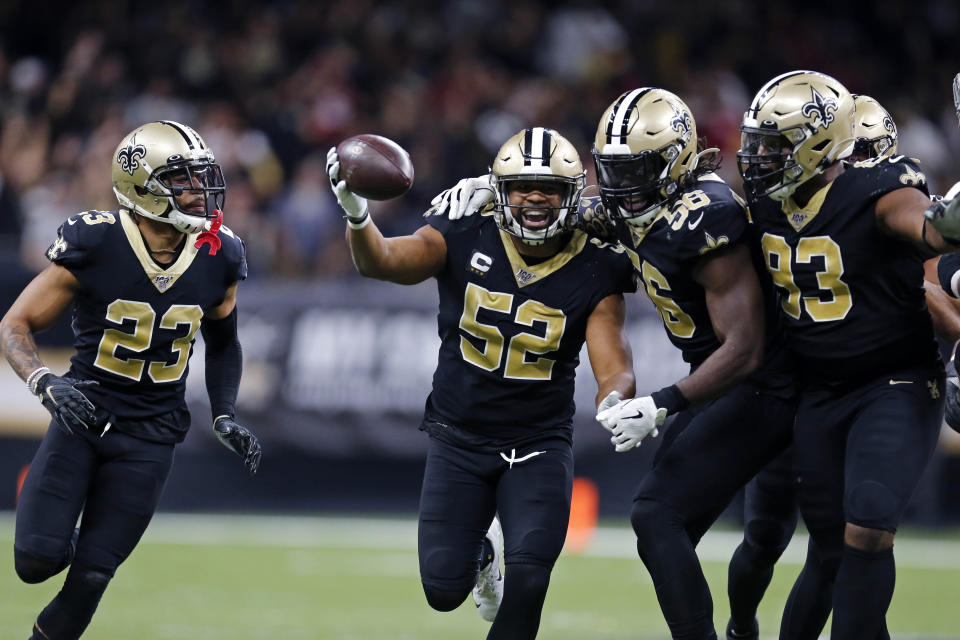 New Orleans Saints linebacker Craig Robertson (52) celebrates his interception in the second half an NFL football game against the San Francisco 49ers in New Orleans, Sunday, Dec. 8, 2019. (AP Photo/Brett Duke)