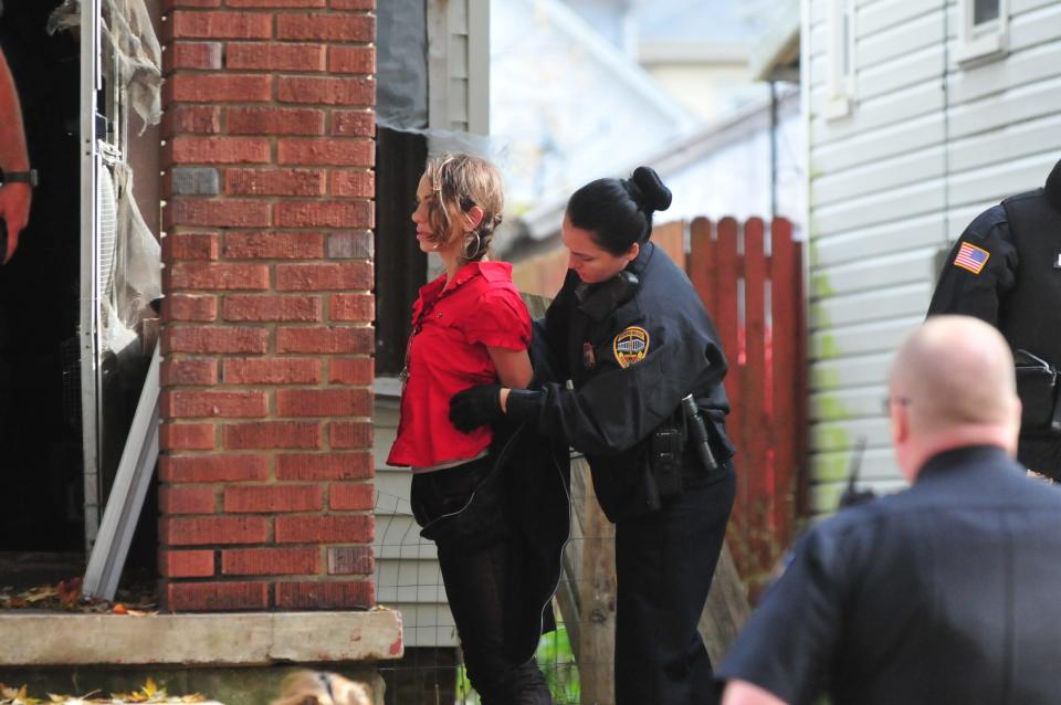 Richmond Police Department Officer Seara Burton assists during an arrest.