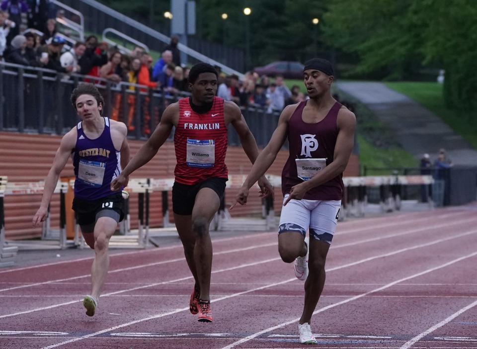 Fordham Prep's Jaylin Santiago wins the 200-meter dash during day 2 action at the 56th annual Glenn D. Loucks Games at White Plains High School on Friday, May 10, 2024.