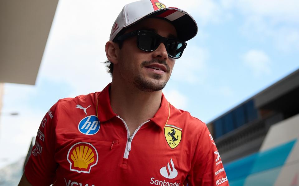 Charles Leclerc walking through the paddock