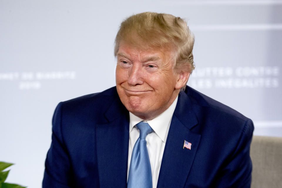 U.S President Donald Trump smiles during a news conference with Japanese Prime Minister Shinzo Abe at the G-7 summit in Biarritz, France, Sunday, Aug. 25, 2019, where they announced that the U.S. and Japan have agreed in principle on a new trade agreement. (AP Photo/Andrew Harnik)
