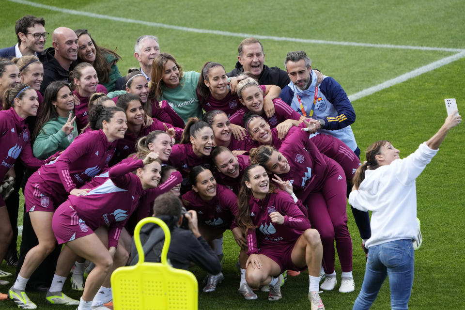 Spains players pose for a photo during a team training session in Sydney Friday, Aug. 18, 2023, ahead of the Women's World Cup final against England on Sunday. (AP Photo/Rick Rycroft)