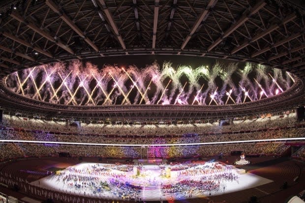 Fireworks light up the sky during the closing ceremony of the Tokyo 2020 Paralympic Games at the Olympic Stadium on Sunday. (Charly Triballeau/AFP/Getty Images - image credit)