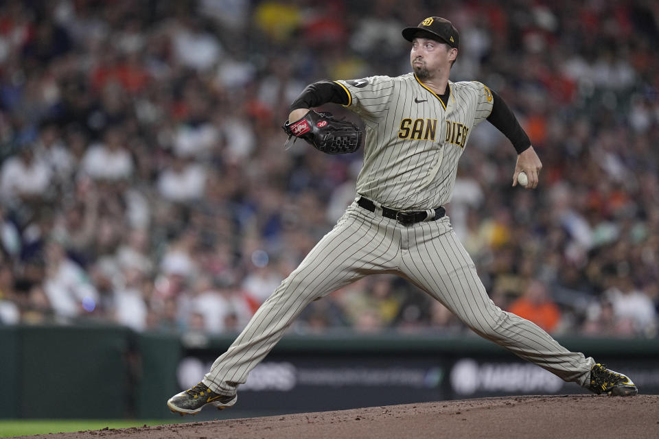 FILE - San Diego Padres starting pitcher Blake Snell delivers during the first inning of the team's baseball game against the Houston Astros, Friday, Sept. 8, 2023, in Houston. Snell is a leading contender for his second Cy Young Award and Gerrit Cole could finally take home his first when baseball's top pitching prizes are announced. (AP Photo/Kevin M. Cox, File)