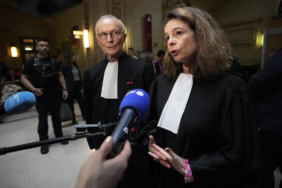 Lawyer Clemence Bectarte answers reporters Tuesday, May 21, 2024 at a courtroom in Paris. A Paris court will this week seek to determine whether Syrian intelligence officials — the most senior to go on trial in a European court over crimes allegedly committed during the country's civil war — were responsible for the 2013 disappearance and deaths of Patrick Dabbagh and his father Mazen. The four-day hearings, starting Tuesday, are expected to air chilling allegations that President Bashar Assad's government has widely used torture and arbitrary detentions to hold on to power during the conflict, now in its 14th year. (AP Photo/Michel Euler)