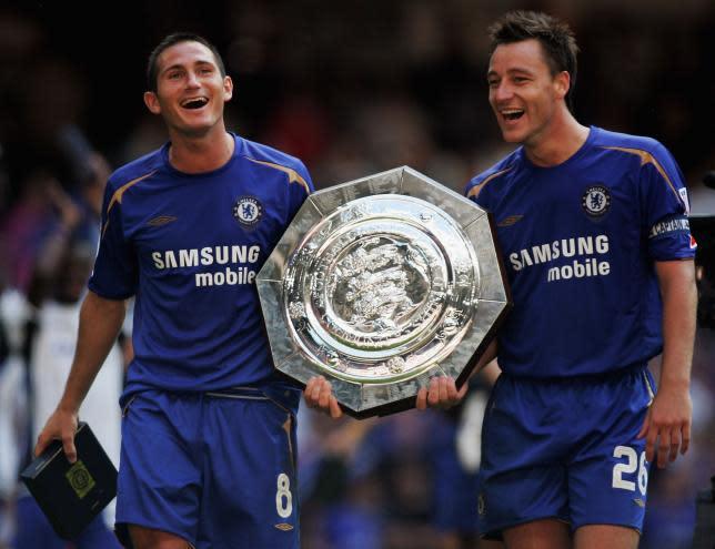 Frank Lampard and John Terry share a joke as they celebrate with the FA Community Shield in 2005.
