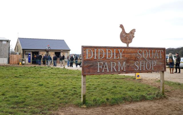 Customers queue to get into Jeremy Clarkson&#39;s Diddly Squat Farm Shop near Chadlington in Oxfordshire during the opening weekend of the shop following its winter closure. Picture date: Saturday February 11, 2023.