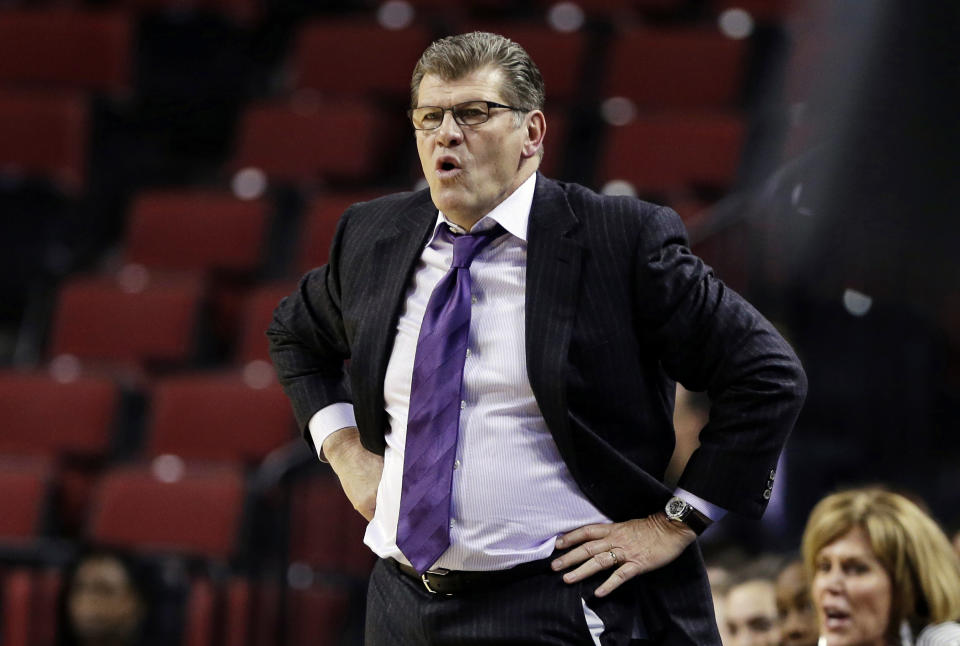 Connecticut coach Geno Auriemma follows his team during the first half of a regional semifinal against BYU in the NCAA college basketball tournament in Lincoln, Neb., Saturday, March 29, 2014. (AP Photo/Nati Harnik)