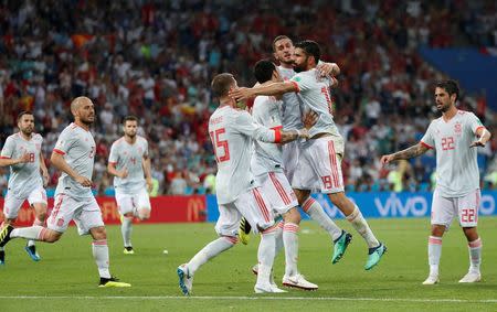 Soccer Football - World Cup - Group B - Portugal vs Spain - Fisht Stadium, Sochi, Russia - June 15, 2018 Spain's Diego Costa celebrates scoring their second goal with Sergio Busquets, Koke, Sergio Ramos and team mates REUTERS/Murad Sezer