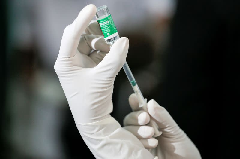 FILE PHOTO: A health official draws a dose of the AstraZeneca's COVID-19 vaccine manufactured by the Serum Institute of India, at Infectious Diseases Hospital in Colombo