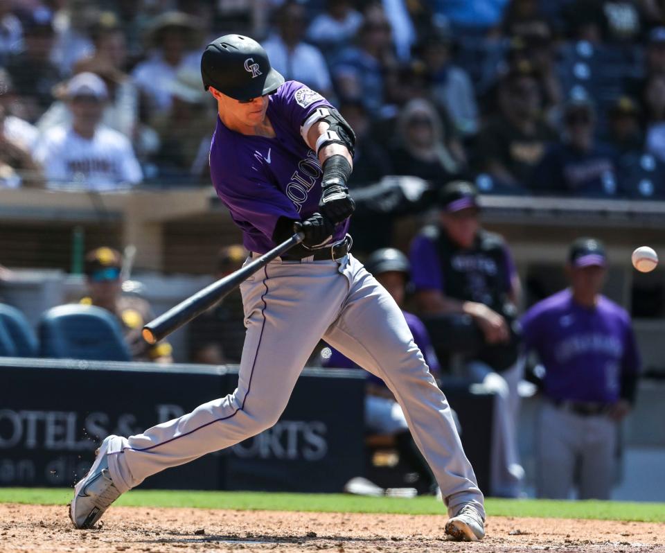 Colorado Rockies catcher Brian Serven (6) earns a hit during a game at Petco Park in San Diego, Calif., Saturday, June 11, 2022. 