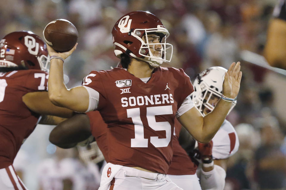 FILE - In this Saturday, Sept. 7, 2019 file photo, Oklahoma quarterback Tanner Mordecai (15) throws in the fourth quarter of an NCAA college football game against South Dakota, in Norman, Okla. Mordecai is competing with Spencer Rattler for the starting spot. (AP Photo/Sue Ogrocki, File)