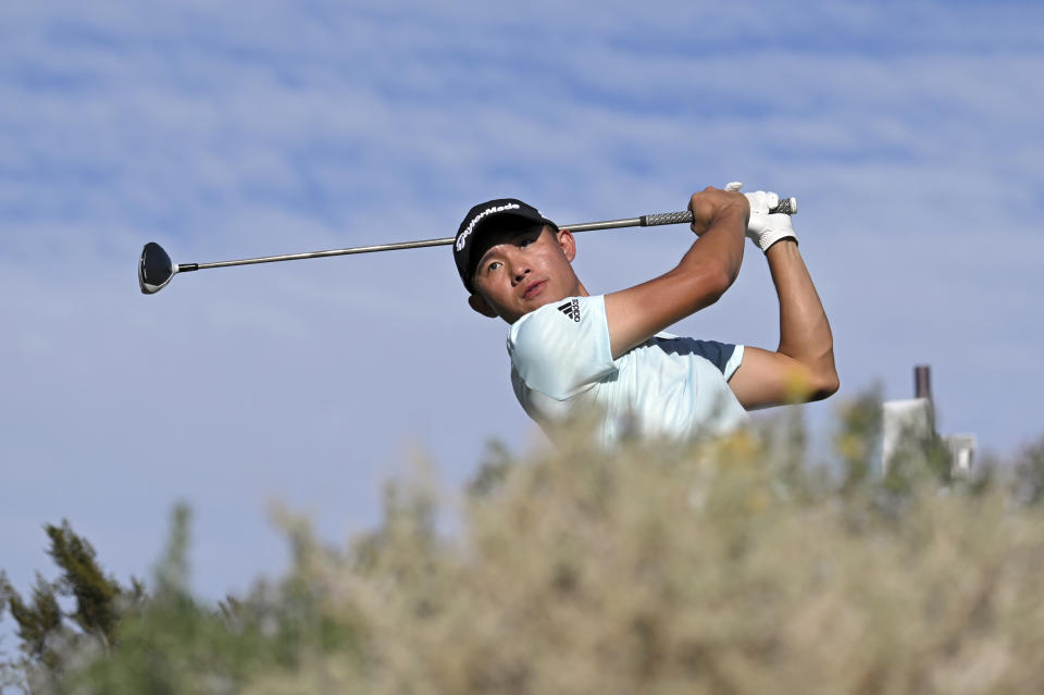 Collin Morikawa watches his tee shot on the 17th hole during final round play of the CJ Cup golf tournament, Sunday, Oct. 17, 2021, in Las Vegas. (AP Photo/David Becker)