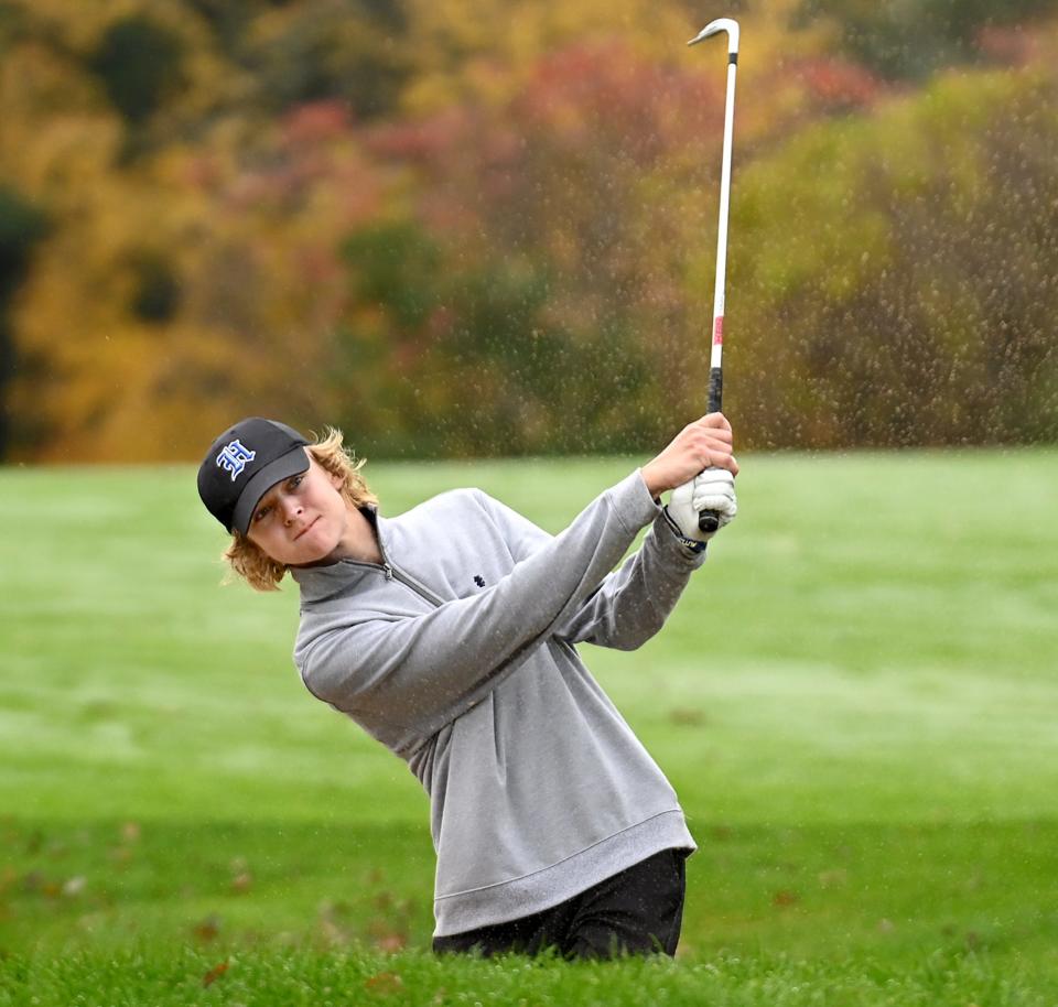 Hopedale's Colin Haynes hits out of a fairway bunker during the MIAA Div. 3 golf championship match at Ledges Golf Club in South Hadley, Oct. 24, 2022.  