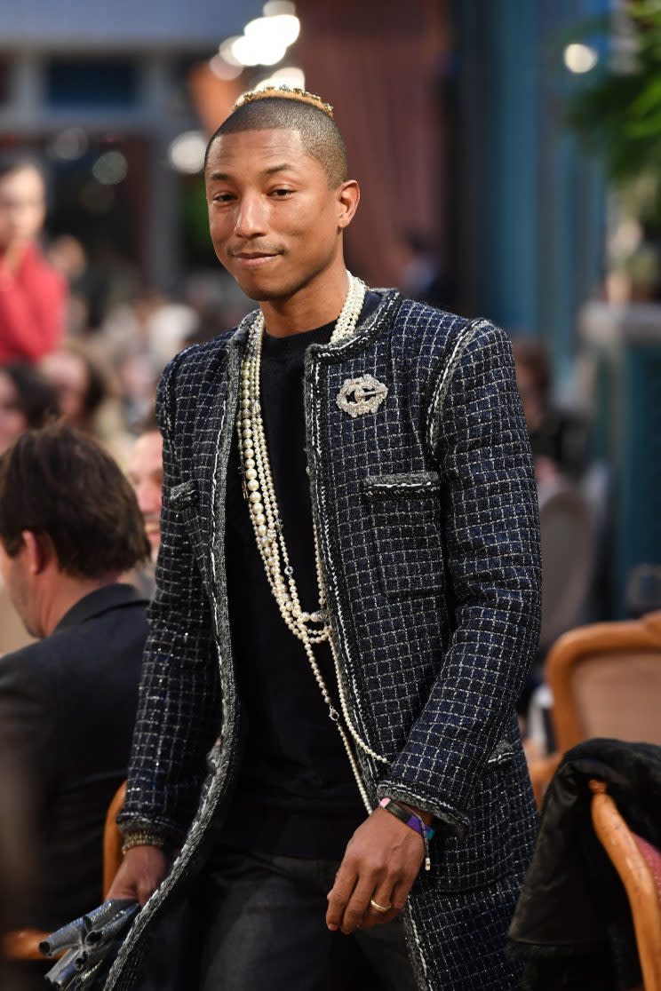 Pharrell walking through the Paris Ritz venue. (Photo: Getty Images)