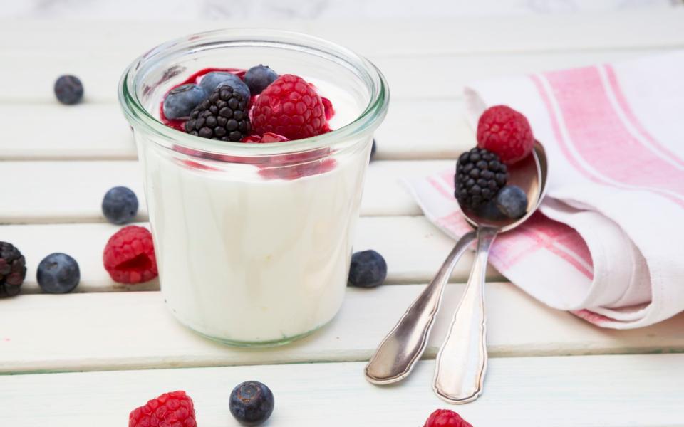 Yoghurt with berries can help rehydrate the morning after - getty