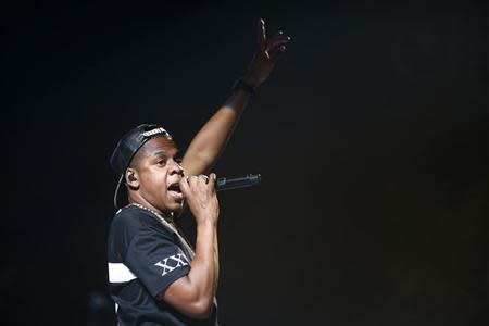 American rapper Jay-Z performs at Bercy stadium in Paris, October 17, 2013. REUTERS/Benoit Tessier