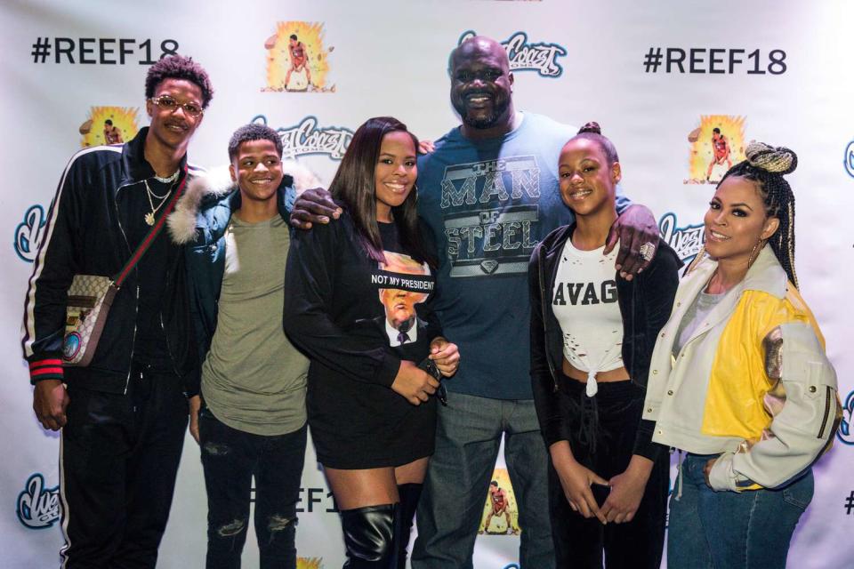 Shareef O'Neal (L) poses with Shaquille O'Neal (C) and Shaunie O'Neal (R) as he celebrates 18th birthday party at West Coast Customs on January 13, 2018 in Burbank, California