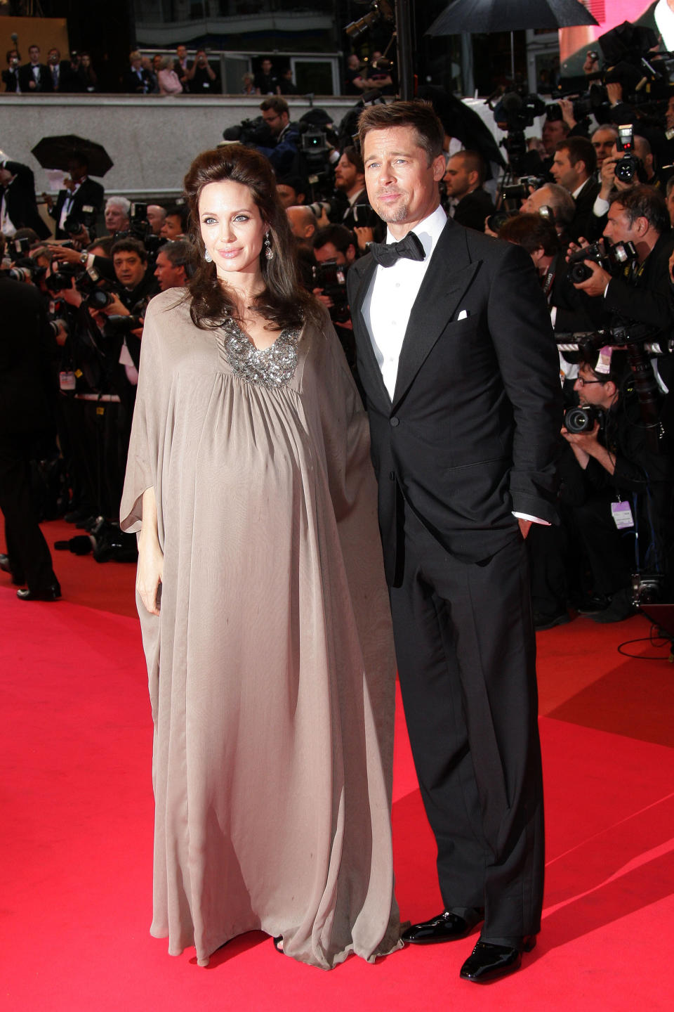 Angelina confirms that she is pregnant with twins at Cannes Film Festival in May 2008. 