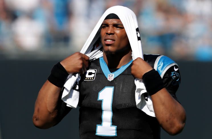 Cam Newton grabbed the ear of NFL commissioner Roger Goodell this week. (Getty Images) 