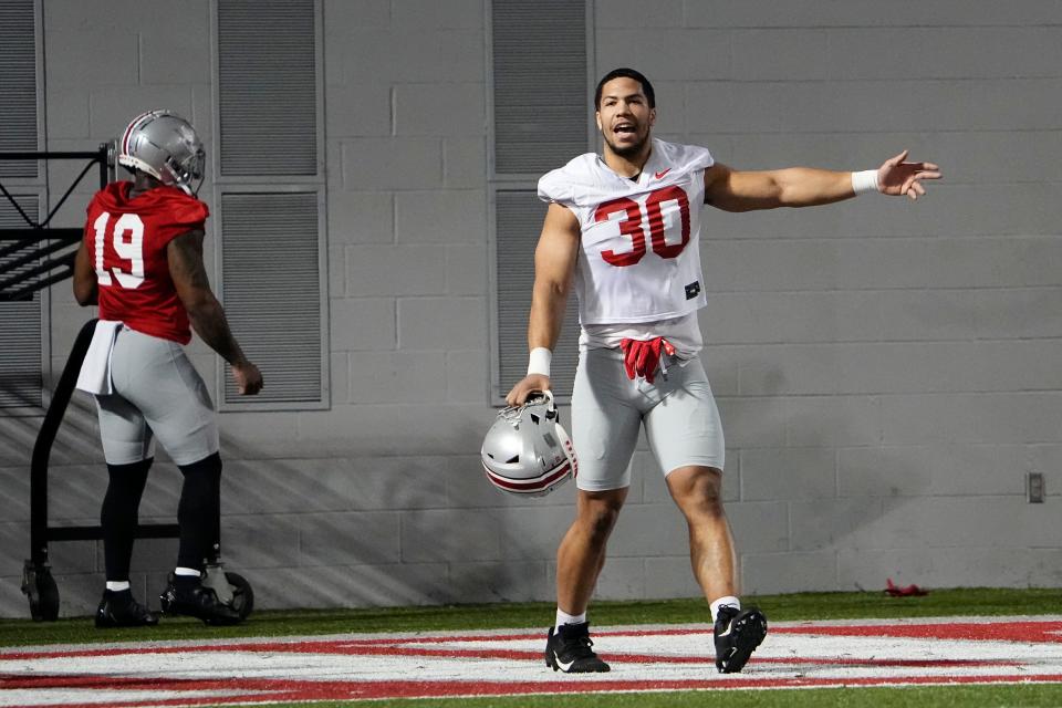 Mar 7, 2023; Columbus, Ohio, USA;  Ohio State Buckeyes linebacker Cody Simon (30) yells to teammates during spring football drills at the Woody Hayes Athletic Center. Mandatory Credit: Adam Cairns-The Columbus Dispatch