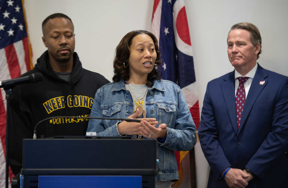 Streetsboro residents Tim and Tamia Woods, whose 17-year-old son, James, died by suicide in November after becoming a sextortion victim, appear with Lt. Governor Jon Husted during a press conference Thursday on the proposed Social Media Parental Notification Act.