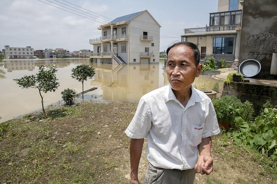 Cheng Xuannan, a resident of Chengjia village, where people have been stranded for a week without help.